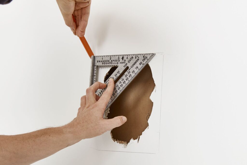 repair-a-large-hole-in-drywall-1824831_hero_1540-cba85d2dcdd34c338c8132be554694b2-min
